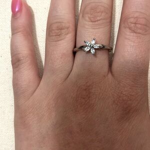 silver ring with light blue flower